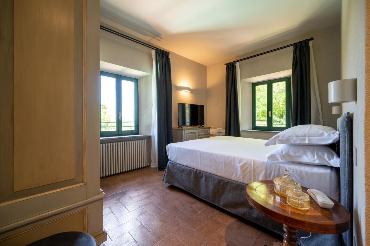 Отель Palazzo Viviani Castello Di Монтегридольфо Экстерьер фото